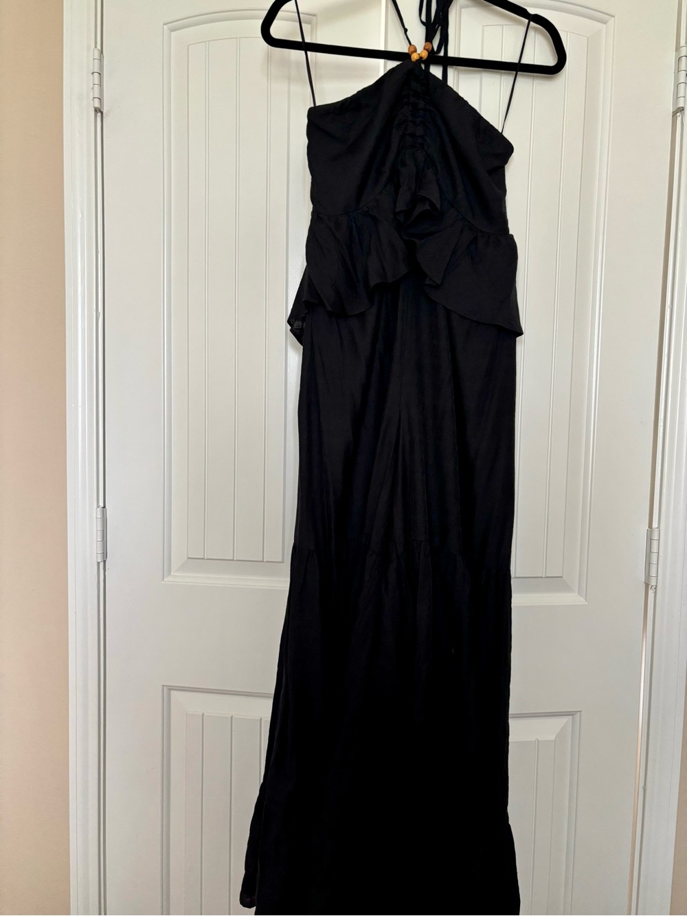 eesome Boutique: Black Halter Ruffle Maxi Jumpsuit